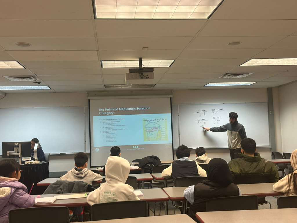 Educator teaching the points of articulation to students